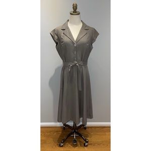 Calvin Klein Belted shirtdress with collar and cap sleeves.
